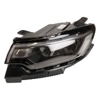 Reflektor przedni lewy