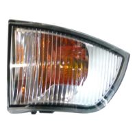 Nasadka wskaźnika na prawej żółtej nasadce w lusterku